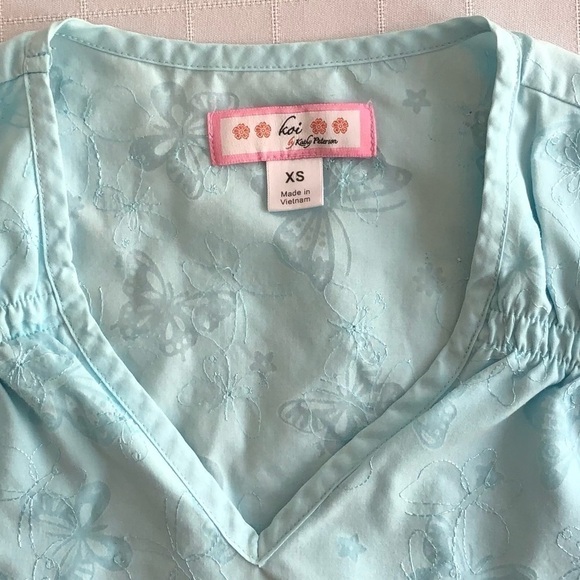 KOI turquoise scrub uniform top. Butterfly print & embroidery. Size XS - Picture 6 of 9